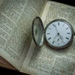 Silver Pocket Watch and Bible